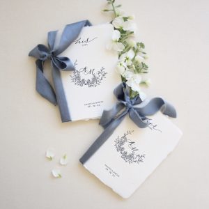 His & Her vow Books - Blue floral crest with calligraphy